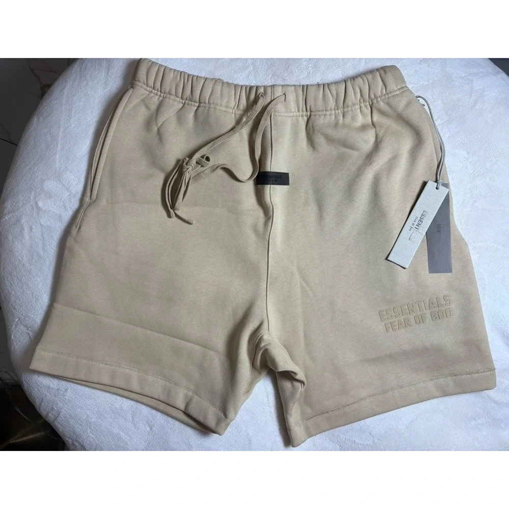 Men's medium Fear of God Essentials baggy sand colored sweat shorts. NEW.